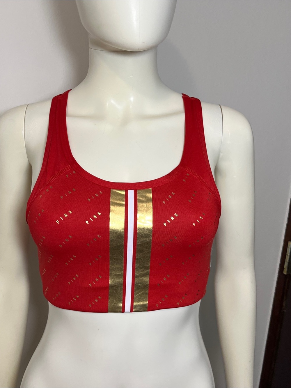 PINK Victoria's Secret Red Sports Bra with Gold Stripe Accent